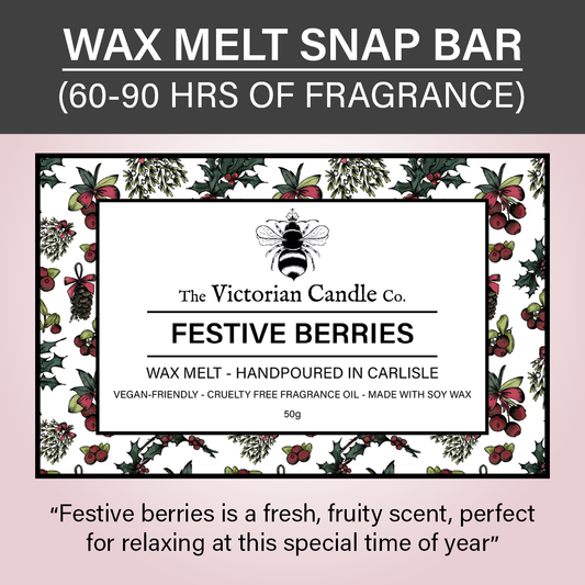 The packaging of a Festive Berries - Wax Melt Snap Bar 🎅🏻 by The Victorian Candle Co. showcases its vegan-friendly soy wax blend. With holly and berries in the backdrop, the label assures 60-90 hours of enchanting fragrance.
