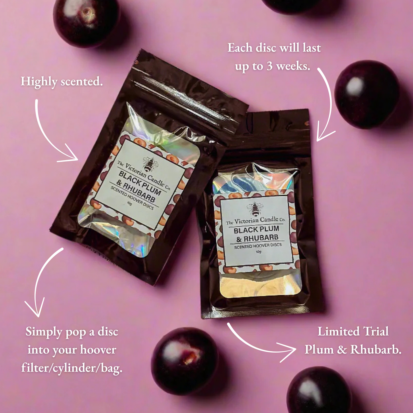 Two packages of 'Black Plum & Rhubarb' scented discs on a pink background with plum fruits.